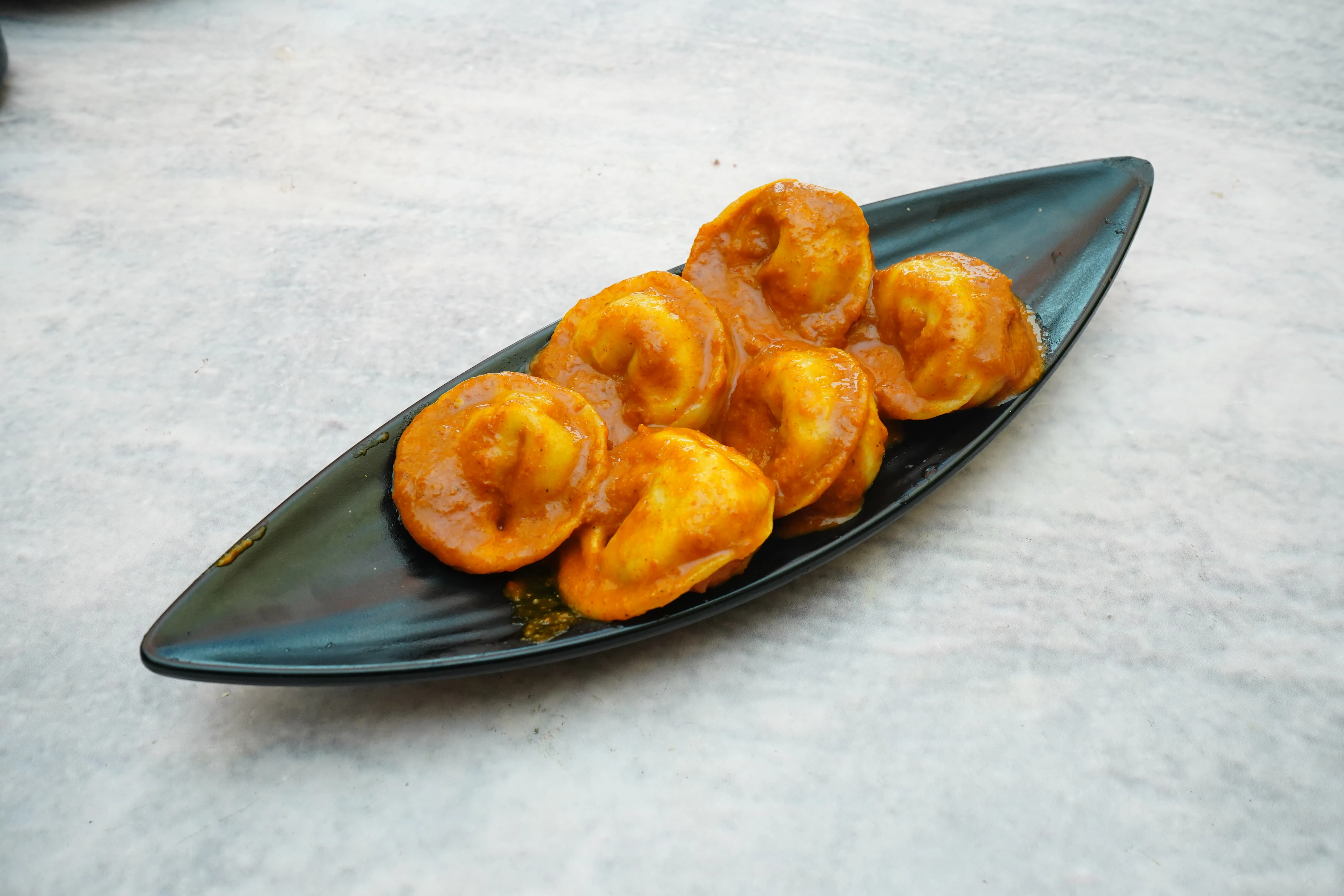 Schezwan Tossed Soya MIx Veg Suji Momo